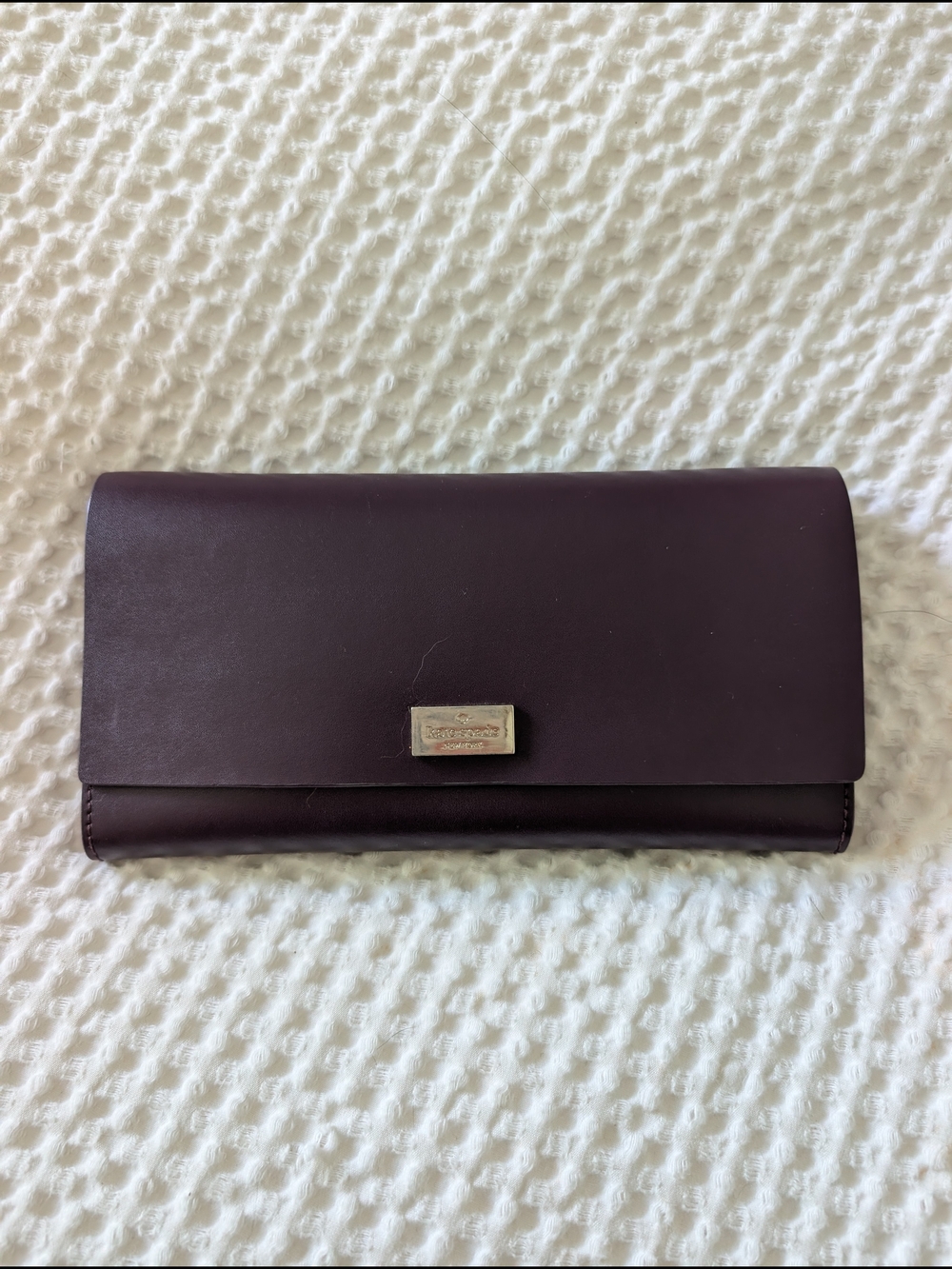 kate spade Plum Leather Flap Wallet with Metal Logo